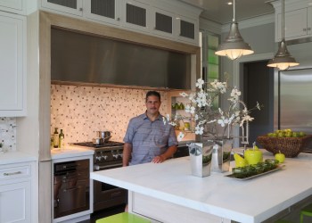 Gary Ciuffo of Ciuffo Cabinetry stands in the kitchen his firm designed for the Hampton Designer Showhouse.