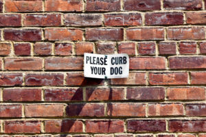 Curb Your Dog sign