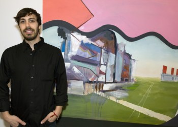 Brooklyn artist Jonathan Beer one of the 4 artist in the 9th Annual Thanksgiving Collective, The Worlds We Create, exhibition at Tripoli Gallery, Southampton, standing in front of one of his works.