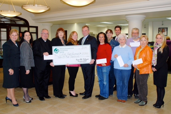 Photo: pictured left to Right: Margaret Meighan, BNB East Hampton Branch Manager; Susan Schaefer, BNB Bridgehampton Branch Manager; Father Edward Sheridan, St. Rosalie’s Church, Hampton Bays; Tracey Lutz, Maureen’s Haven; Kerry Lewendoski, Human Resources of the Hamptons; Kevin O’Connor BNB President & CEO; Gabrielle Scarpaci and Sigrid Benedetti, East Hampton Food Pantry; Edward Burger, BNB Southampton Branch Manager; Evelyn Ramunno, Sag Harbor Community Food Pantry; Gene Scanlon, Bridgehampton Community Food Pantry; Dru Raley, Springs Food Pantry; Sabrina Aucello, BNB Sag Harbor Branch Manager