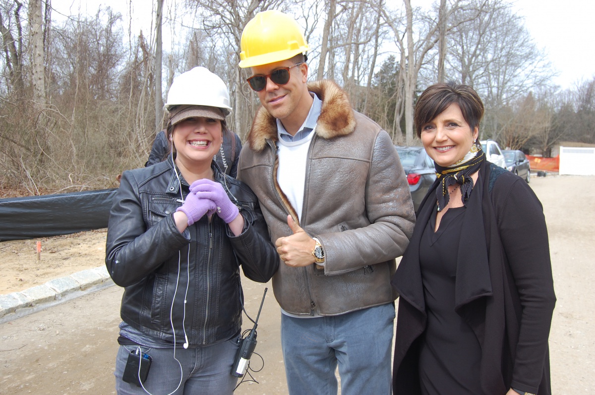 Frederick Eklund gives the thumbs up, flanked by a "Million Dollar Listing New York" staffer and Douglas Elliman's Terry Thompson.