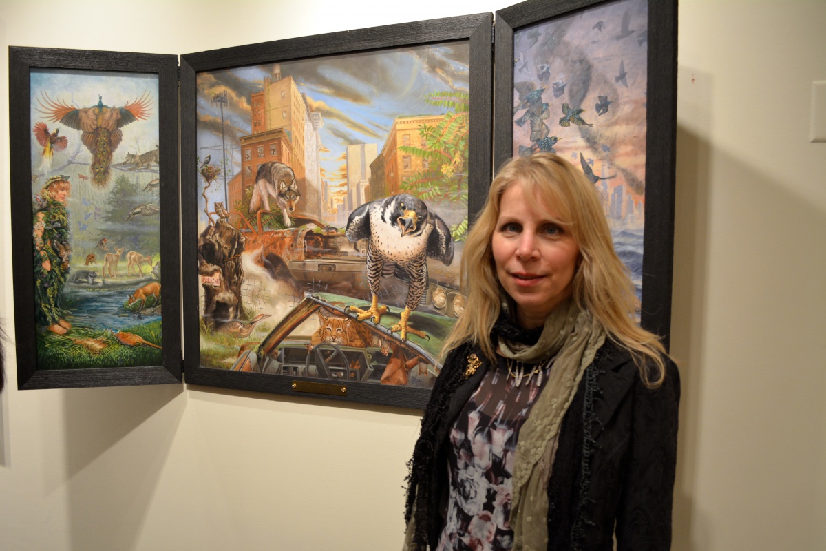 Tricia Zimic and her triptych "Garden of Earthly Delights."