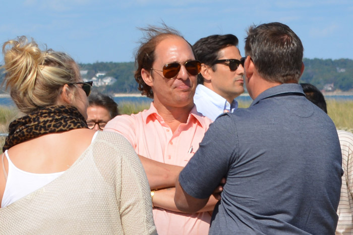 Matthew McConaughey at the Jimmy Aery Way parking lot off Meadow Lane in Southampton Village speaks with Marissa Epley and Southampton Village Mayor Mark Epley.