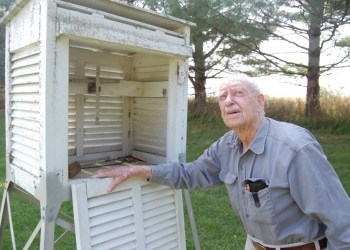 Richard Hendrickson at his weather station. Photo credit: Brendan J. O'Reilly