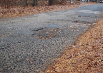 A private road in Hampton Bays has fallen into disrepair. Photo credit: Brendan J. O'Reilly
