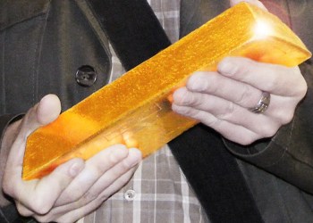 Derwood Hodgegrass shows off potential art supplies in the form of a gold bar