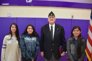 Matthew Dwyer at his ceremony on Friday, January 27. He is pictured with Hampton Bays High School VFW Patriot’s Pen essayists Alisia Soto, Alexa Armas and Melissa Gruzman