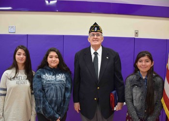 Matthew Dwyer at his ceremony on Friday, January 27. He is pictured with Hampton Bays High School VFW Patriot’s Pen essayists Alisia Soto, Alexa Armas and Melissa Gruzman