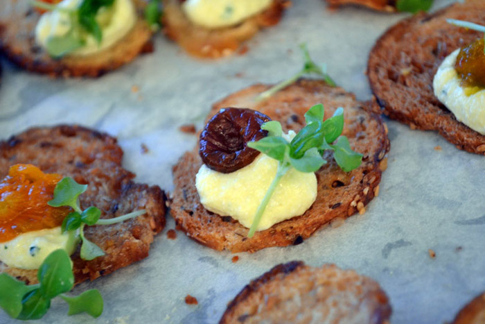 Corn Infused Ricotta with local Honey, Roasted Heirloom Cherry Tomato on a Multigrain Crostini by Fifth Season Restaurant, Chef Erik Orlowski & Chef John Urbinati: