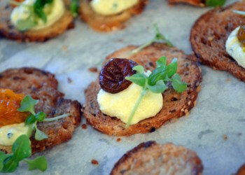 Corn Infused Ricotta with local Honey, Roasted Heirloom Cherry Tomato on a Multigrain Crostini by Fifth Season Restaurant, Chef Erik Orlowski & Chef John Urbinati: