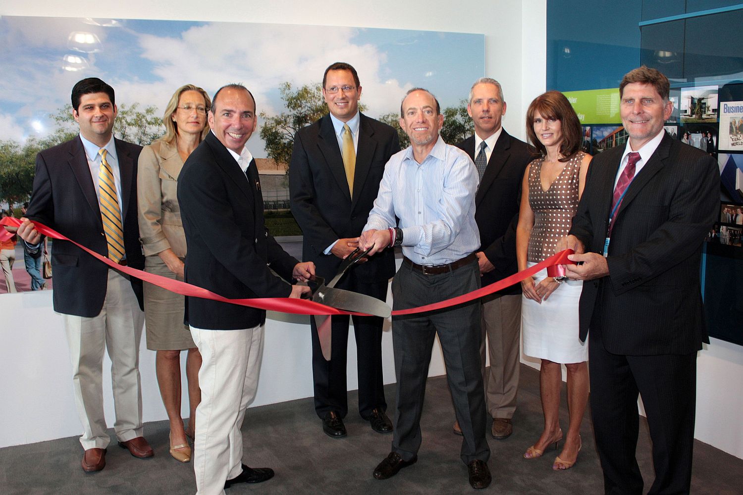 Cutting the ceremonial ribbon are Rechler Equity Managing Partners Gregg Rechler (left) and Mitchell Rechler, with (from l to r) Suffolk County IDA CEO & Executive Director Anthony Manetta, Southampton Councilwoman Bridget Fleming, Southampton Councilman Christopher Nuzzi, Southampton Councilman James Malone, Southampton Supervisor Anna Throne-Holst, and Suffolk County Airport Manager Anthony Ceglio.