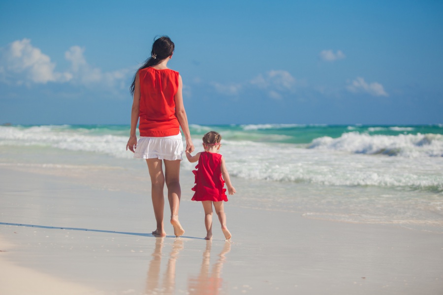 Mother and daughter on the beach