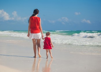 Mother and daughter on the beach