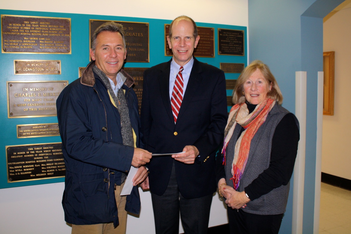 Hampton Designer Showhouse Foundation board member Brian Brady, Southampton Hospital President and CEO Robert S. Chaloner, and Hampton Designer Showhouse Operations Manager Mary Lynch.