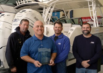 From left to right: Ernie Miller, Head Mechanic; Tony Villareale, President; Mike Friscia, Service Manager; and Mike McSweeney, Service Director