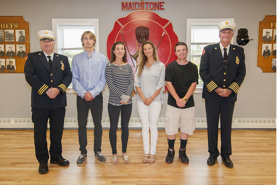 East Hampton Fire Department Chiefs Gerard Turza Jr. and Kenneth Wessberg Jr. with the 2015 East Hampton Fire Department Scholarship winners (L-R) Robert Anderson III, Jenna Budd, Lydia Budd and Ryan Bono at the fire department headquarters on Cedar Street.