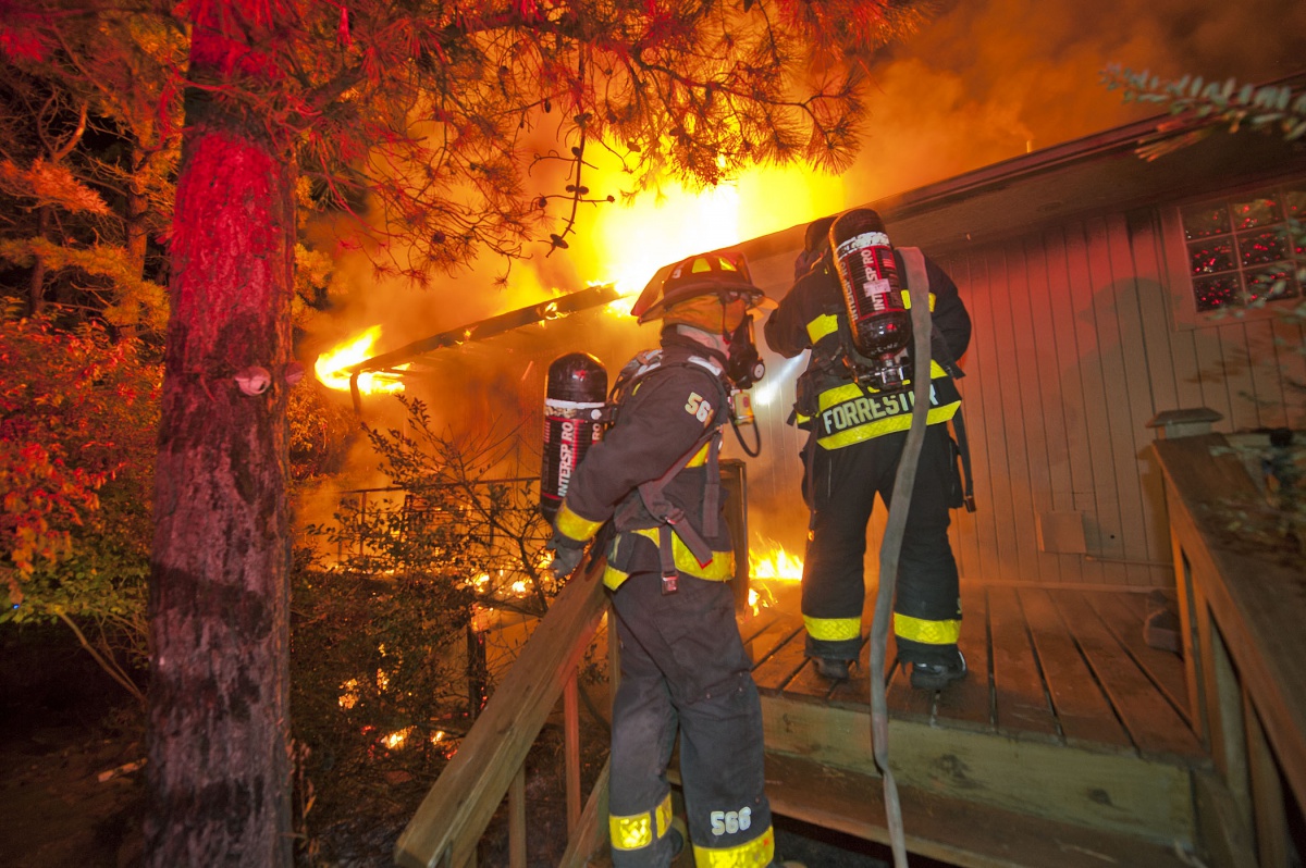 East Hampton firefighters battle a blaze early on October 31. Photo credit: Michael Heller/EHFD