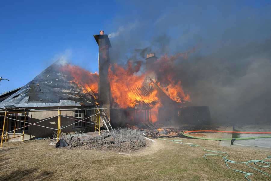 At 2:35 p.m. on Wednesday, March 18th, 2015, members of the East Hampton Fire Department responded to the Morton residence for a report of a structure fire. First arriving units found the structure, which was under renovation at the time, heavily involved with fire. Mutal aid was called from the Montauk, Amagansett, Springs, Sag Harbor, Bridgehampton, Southampton and Hampton Bays Fire Departments, and the North Sea Fire Department was called to stand by at the EHFD headquarters. Cold temperatures, a strong wind and water supply challenges made fighting the fire difficult, and eventually heavy equipment was called for to knock the chimneys over and remove debrisi so that all remaining pockets of fire could be extinguished. I was not until well after that 9:00 p.m. that evening that all units were fully back in service. It was suspected that roofers installing new flashing were to blame for the fire, but the East Hampton Village Fire Marshal's office responded and was on scene to determine the fire's cause and origin.