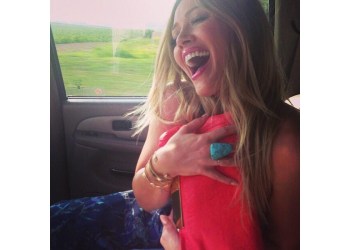 Hilary Duff shows off her Donatienne clutch via Twitter