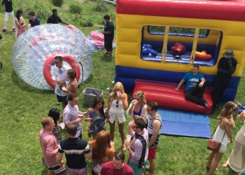 Partying at Kevin Sorbo's Hamptons house for a Last Chance Animal Rescue benefit.