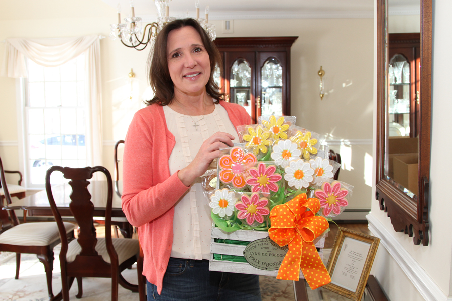 Jean Abazis, food artisan, proudly displays her cookie bouquet