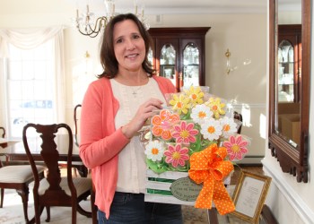 Jean Abazis, food artisan, proudly displays her cookie bouquet