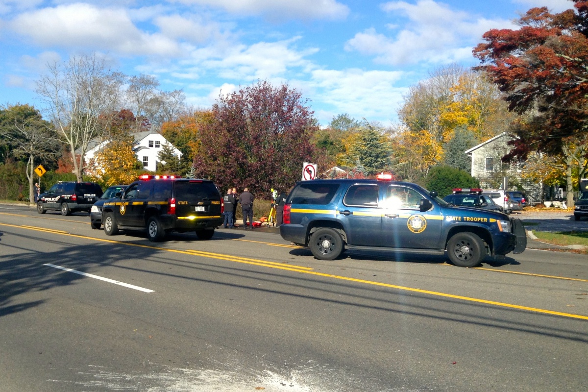 New York State police investigate the accident scene on County Road 39 between Henry Road and Sandy Hollow Road.