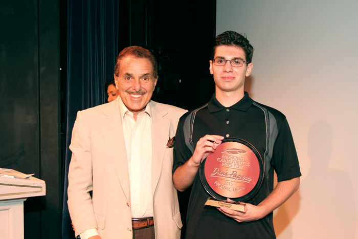Chairman of Barnes and Noble Booksellers Len Riggio poses with the Dan's Papers Emerging Young Writers Prize winner Luke Sawaya