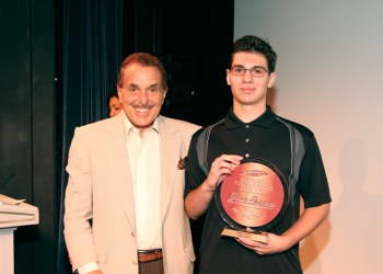 Chairman of Barnes and Noble Booksellers Len Riggio poses with the Dan's Papers Emerging Young Writers Prize winner Luke Sawaya