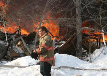 Southampton Fire Department firefighter at the blaze in Water Mill