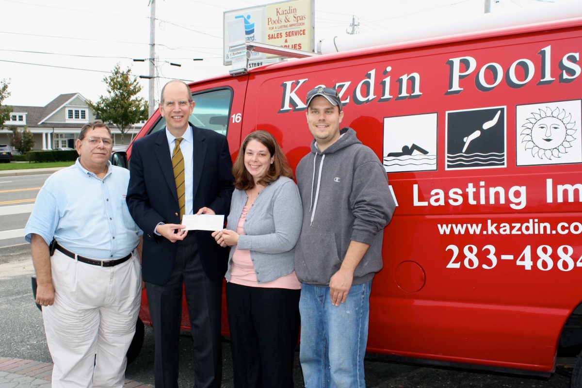 George Kazdin, Robert Chaloner, Julie Kazdin Boucher and Brian Boucher.George Kazdin, Robert Chaloner, Julie Kazdin Boucher and Brian Boucher.