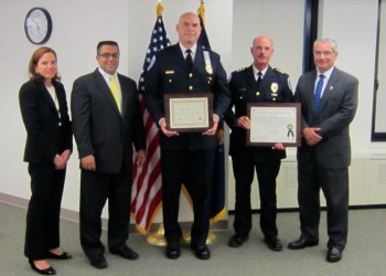 A Jeep SUV stuck in the sand at Mecox.