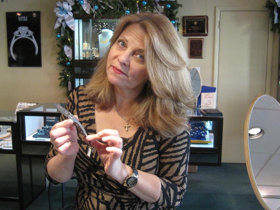 Donnalee Gray of Kay Cameron Fine Jewelry Holding A William Henry Knife