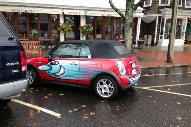 One of two cars painted by Kenny Scharf in Southampton Thursday,