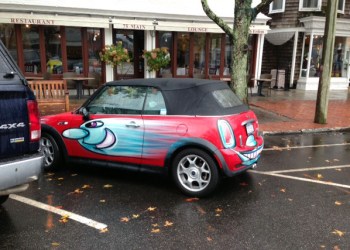 One of two cars painted by Kenny Scharf in Southampton Thursday,