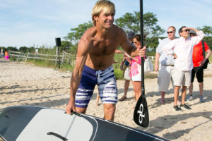 Laird Hamilton with a stand up paddleboard