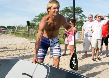 Laird Hamilton with a stand up paddleboard