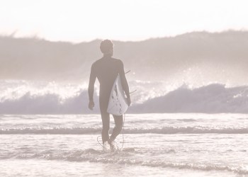 Misty surfing waves