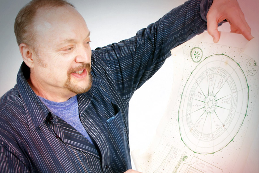 Monte Farber looks over an astrology chart