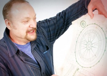 Monte Farber looks over an astrology chart