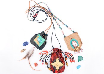 Medicine bags adorn the cover of Monte Farber's Healing Crystals: A Shaman's Guide to Using Energy Stones & Making Medicine Bags