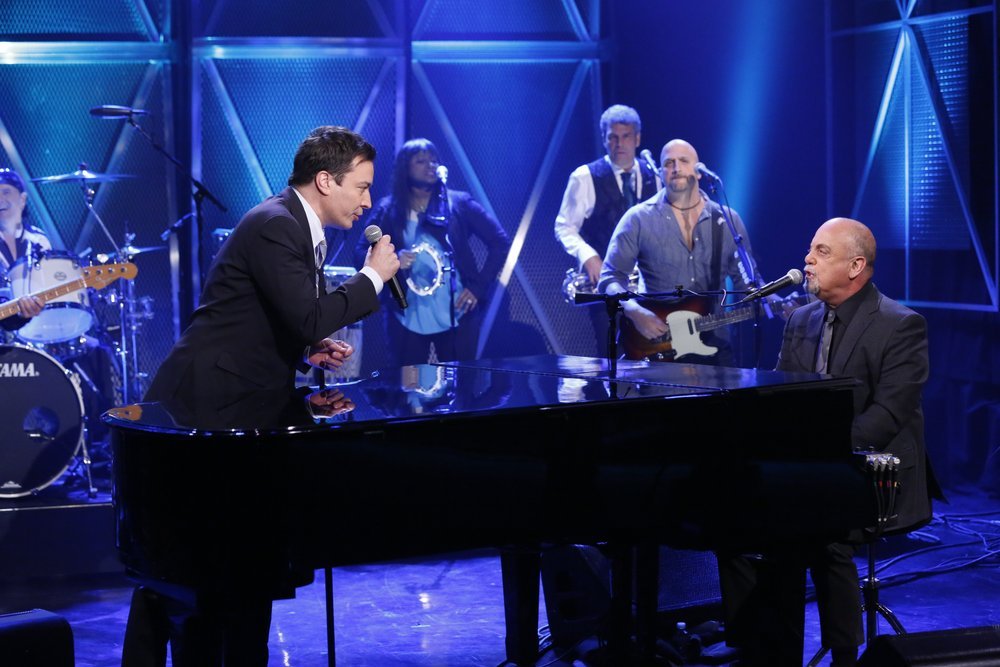 Billy Joel performs "You May Be Right" with host Jimmy Fallon on "The Tonight Show." On guitar is Mike DelGuidice, of Miller Place. Photo credit: Lloyd Bishop/NBC