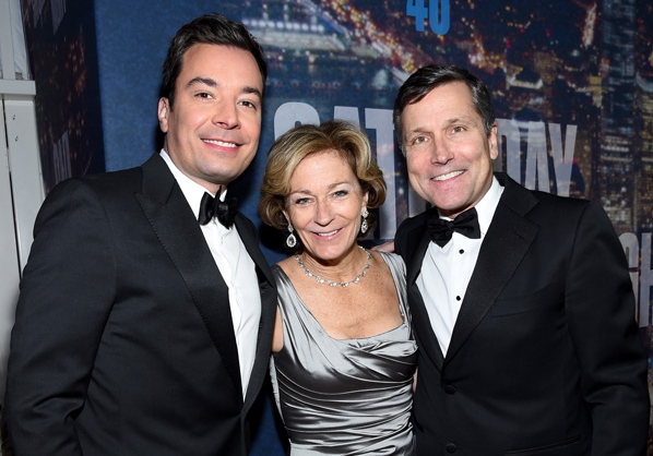 SATURDAY NIGHT LIVE 40TH ANNIVERSARY SPECIAL -- Pictured: (l-r) Jimmy Fallon, Gretchen Burke, Stephen B. Burke, Chief Executive Officer, NBCUniversal, walk the red carpet at the SNL 40th Anniversary Special at 30 Rockefeller Plaza