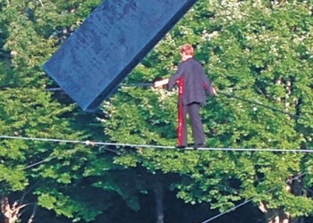 Philippe Petit walks the high wire at Longhouse