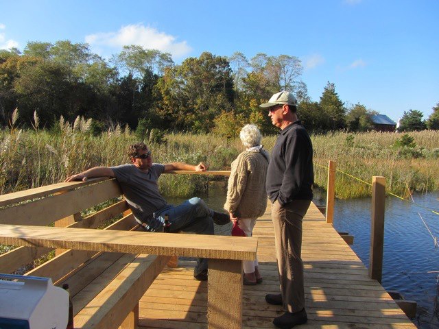 Matthew Bobek, Susan Richardson, Zachary Cohn enjoy the new Pussy's Pond footbridge