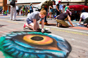 Kimberly Guthrie at the 2014 East End Arts Council Community Mosaic Street Painting Festival