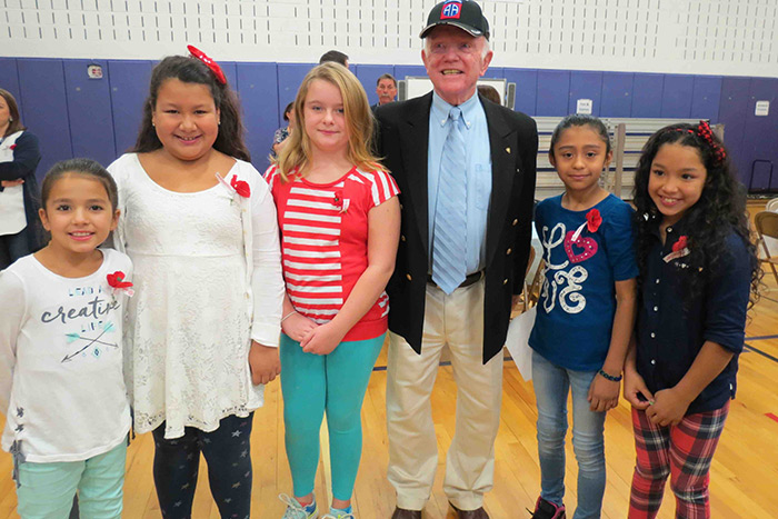 Robert Murray with Hampton Bays Elementary School fourth-graders (l-r) Ashley Rodriguez, Emily Acevedo, Julia Brandes, Stephanie Cardona Claros and Briana Avendano