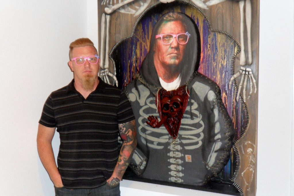 Artist Carl Horn and his portrait, with photography by Rick Wenner.