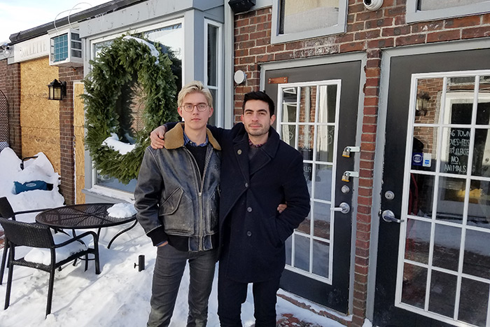 Sag Harbor couple Adrian Stivala and Roman Krugovykh in front of the shuttered SagTown Coffee