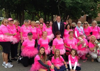 The Coalition for Women's Cancers and Southampton Town Councilman Chris Nuzzi at the San Gennaro Feast of the Hamptons.